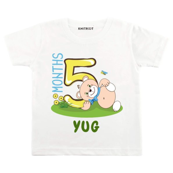 Five month teddy in white tee